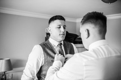 Black dog photography Groom getting ready